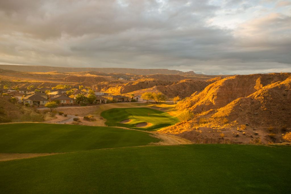 fairway next to the mountains